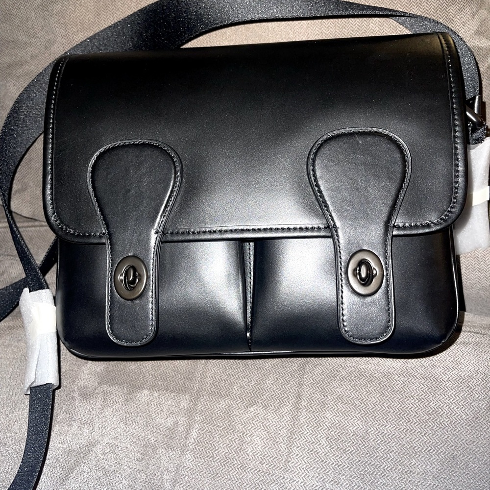 Coach Men’s Heritage Map Bag.